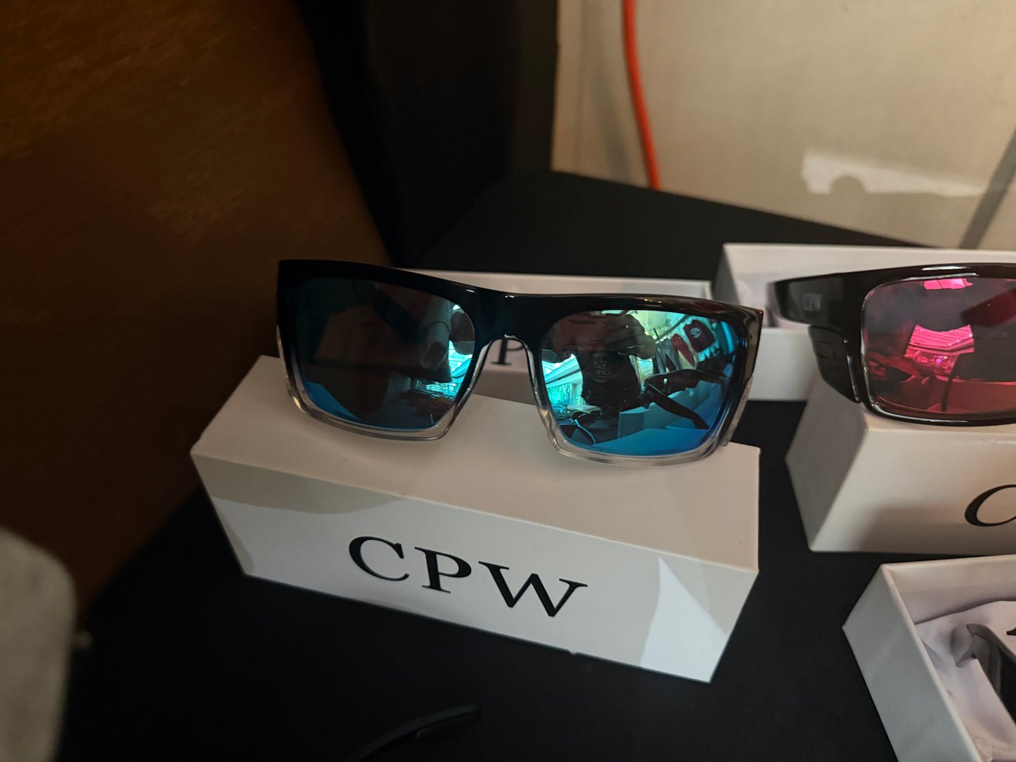 Black/clear frame blue lenses